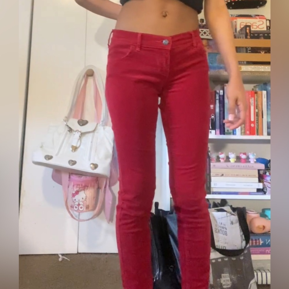 Red corduroy low rise skinny jeans that are super stretchy.